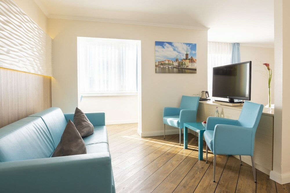 Фото Hotel Vier Jahreszeiten Lübeck