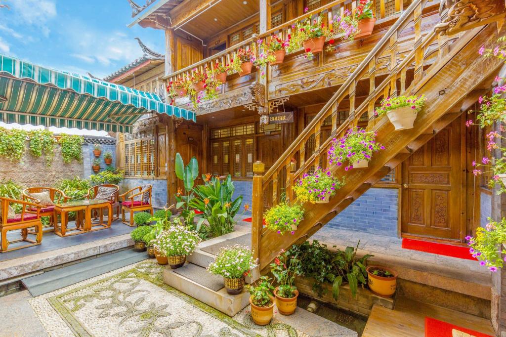 Фото Li Jiang Hemuju Inn