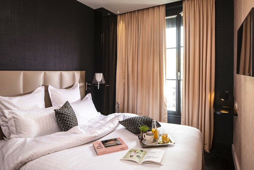 Фото First Hotel Paris Tour Eiffel