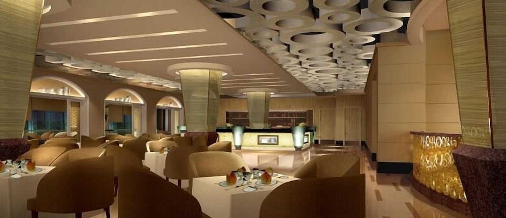 Фото Rainbird International Hotel