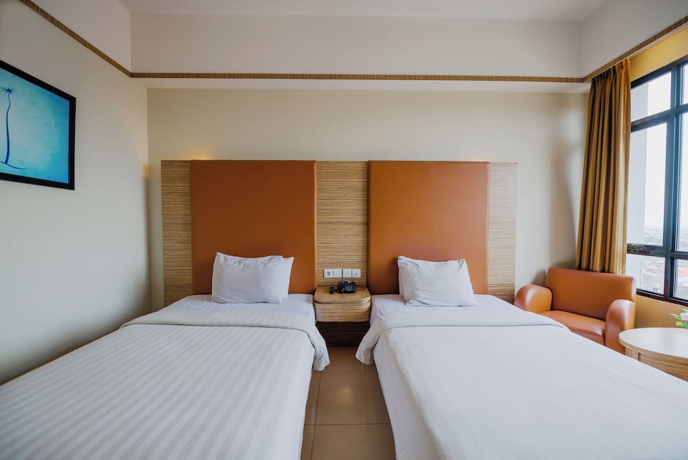 Фото Grand Pasundan Convention Hotel