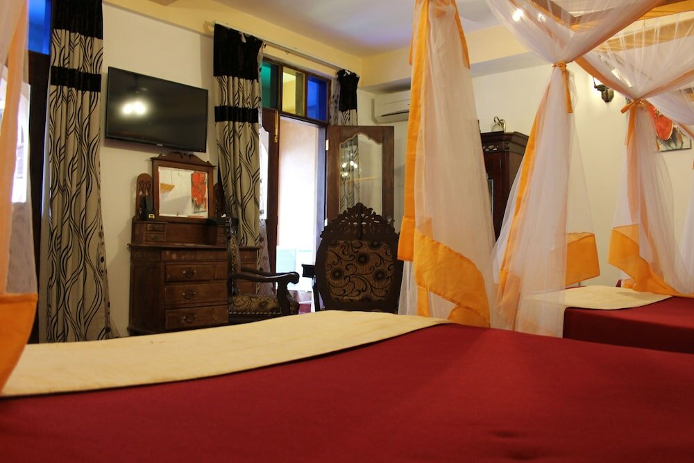 Фото Mizingani Seafront Hotel