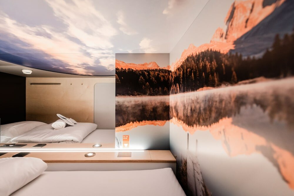 Фото Capsule Hotel - Alpine Garden Zurich Airport