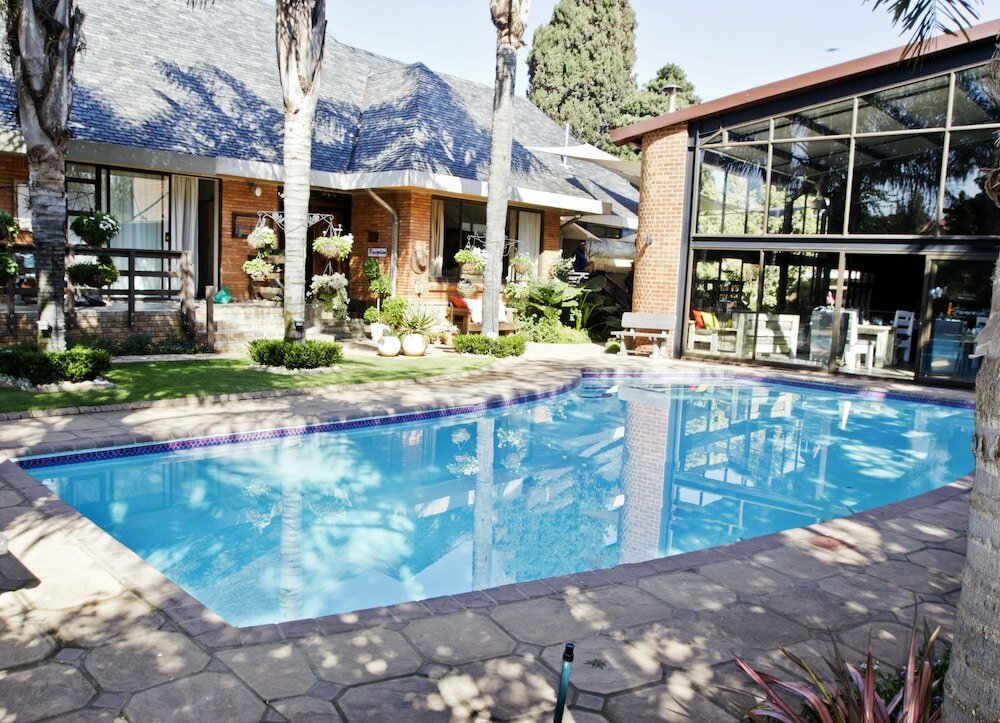 Фото Sunrock Guesthouse