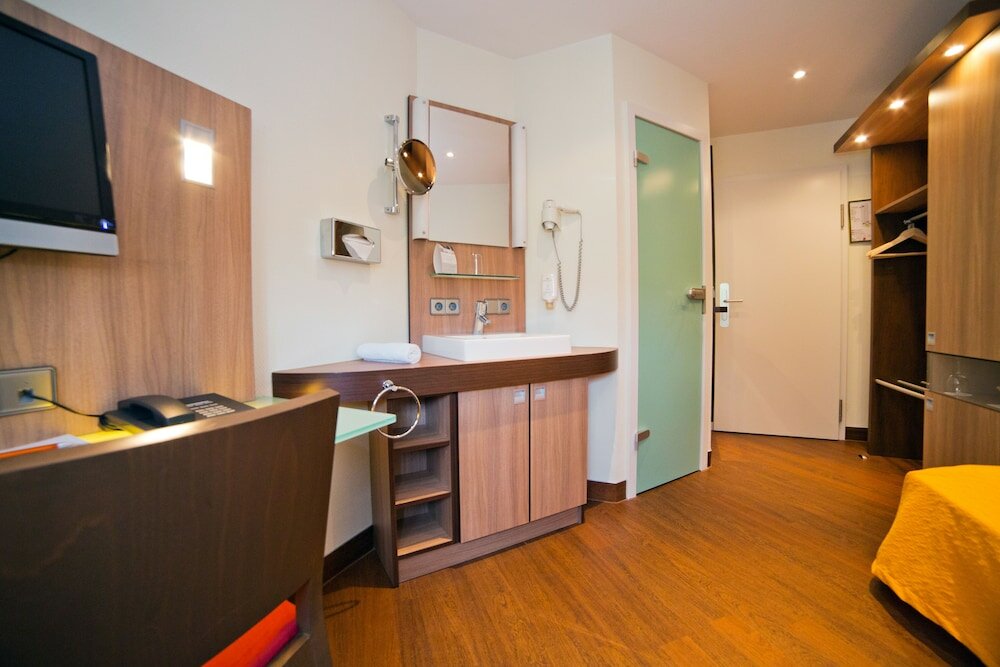 Фото Stadthotel Freiburg