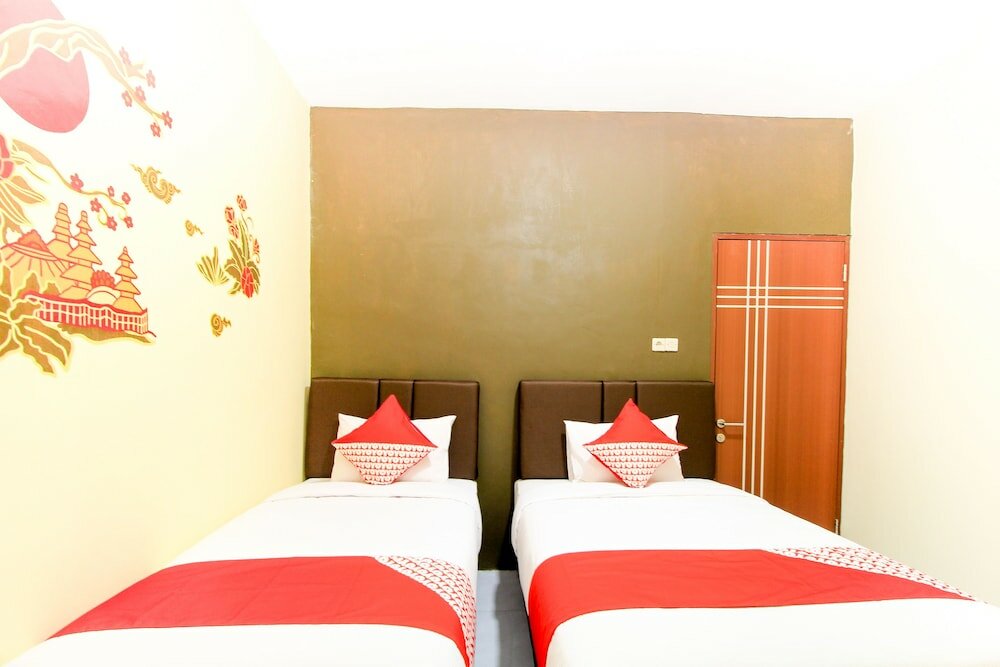 Фото Oyo 217 A1 Hotel