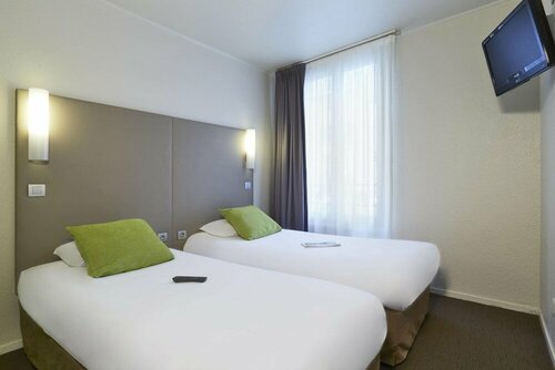 Гостиница Campanile Paris Ouest - Pte de Champerret Levallois в Курбевуа
