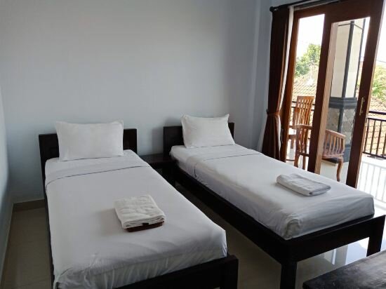 Фото The Wina Echo Beach Guesthouse