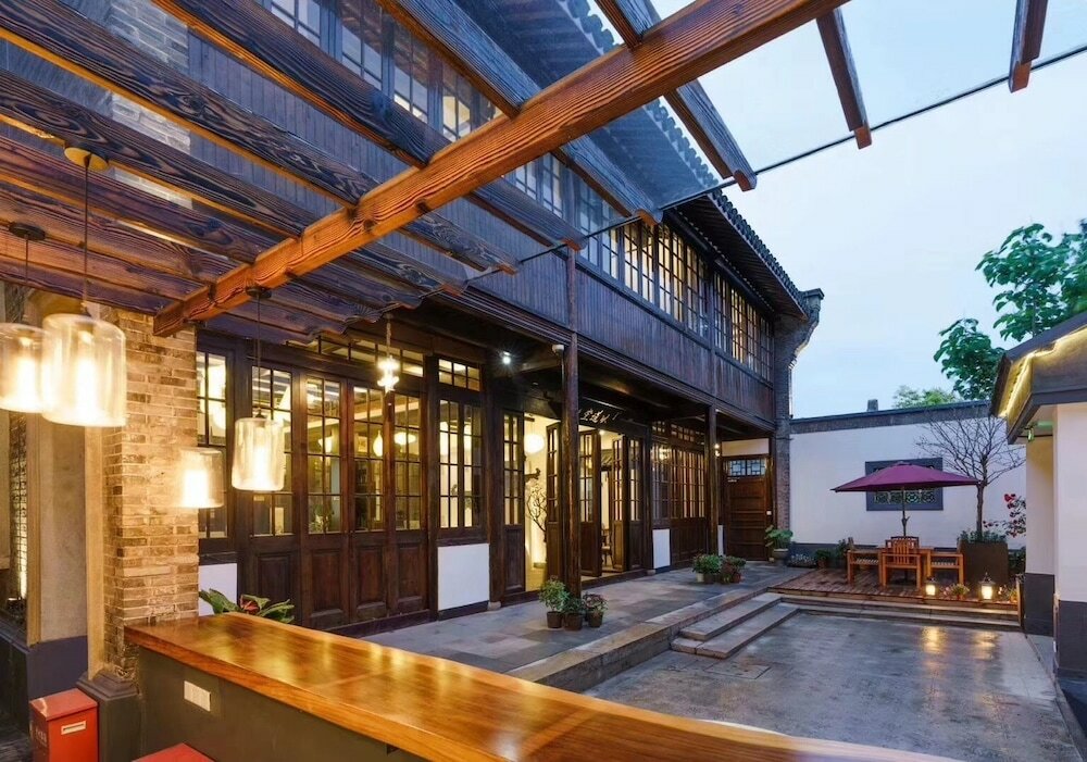 Фото Yi Garden Cultural Hotel Disney Branch