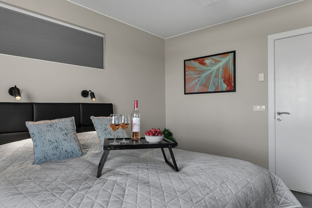 Фото Bella Apartments & Rooms