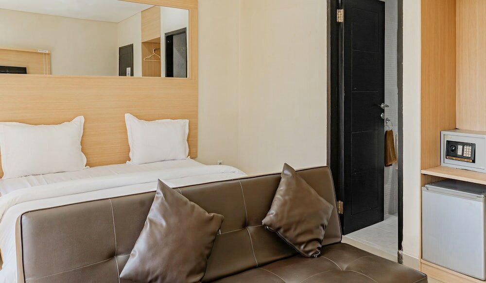 Фото Kuta Airport Insta Hotel