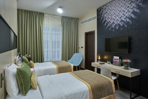 Внешний вид отеля Time Express Hotel Al Khan в Аш-Шардже, фото 2