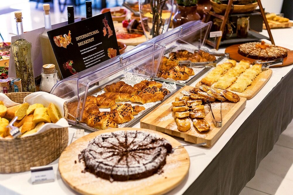 Фото Cornaro Hotel