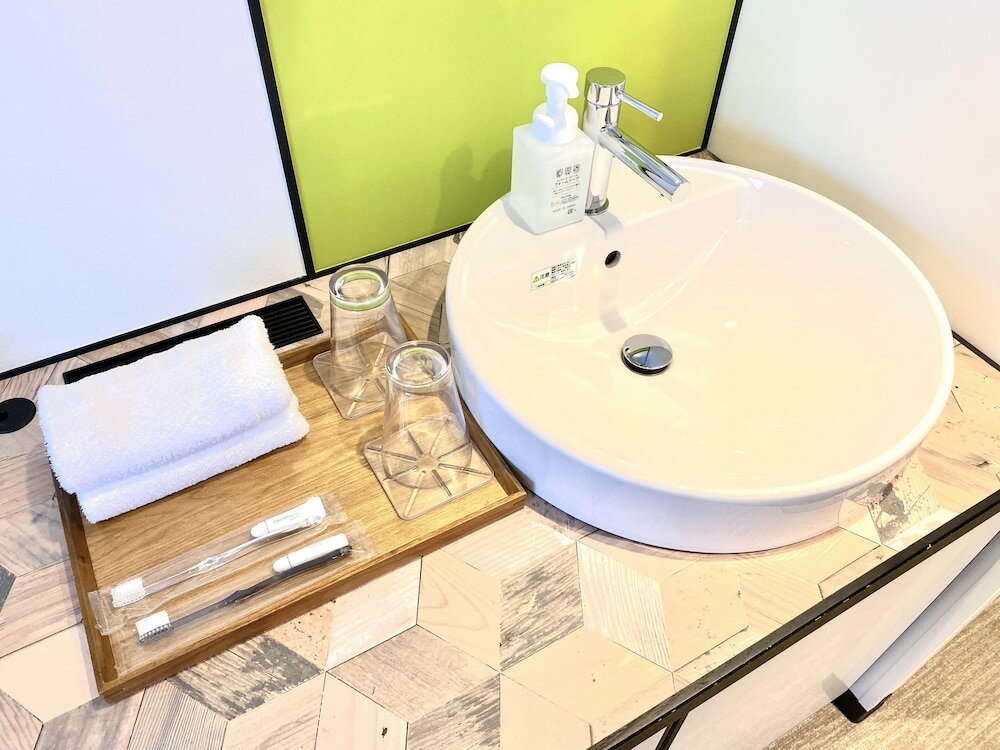 Фото Henn na Hotel Osaka Shinsaibashi