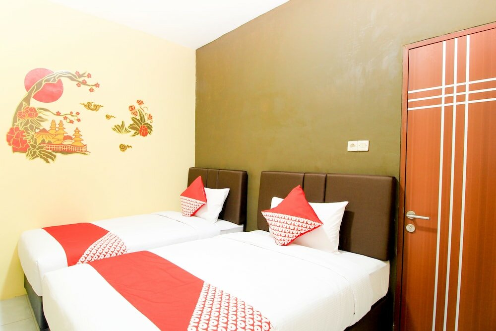 Фото Oyo 217 A1 Hotel