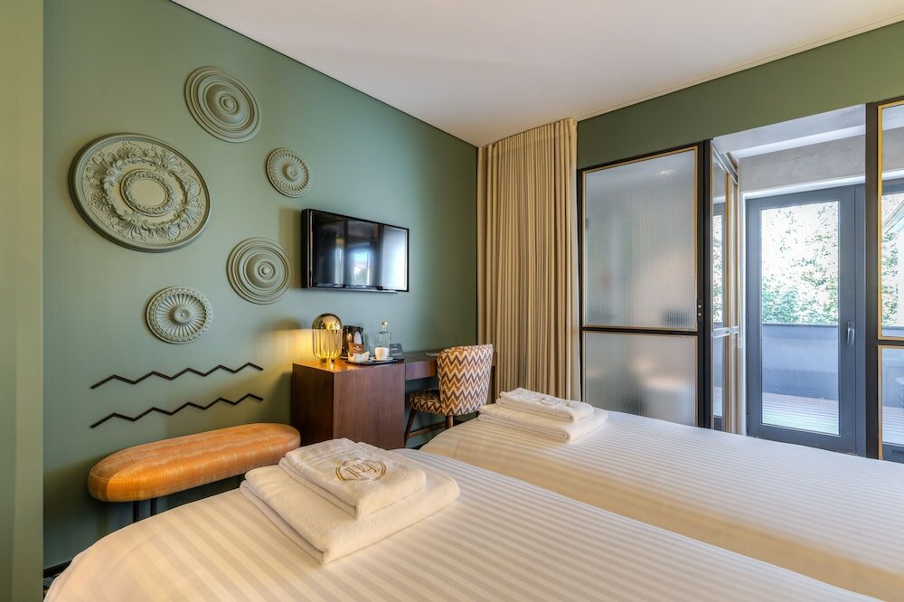 Фото Métier Boutique Hotel