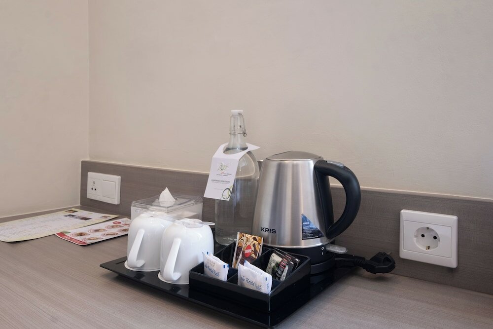 Фото Zest Jemursari by Swiss-Belhotel International