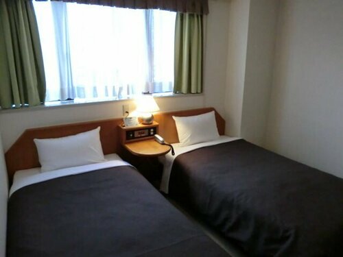 Гостиница Hotel Livemax 本八戸駅前 в Хатинохе