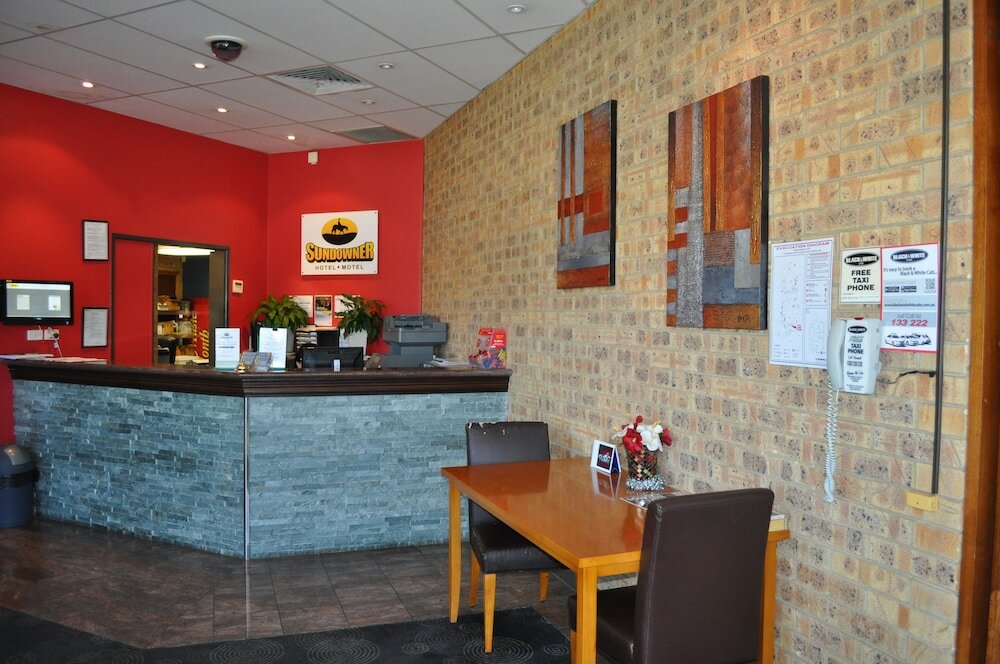 Фото Sundowner Hotel Motel