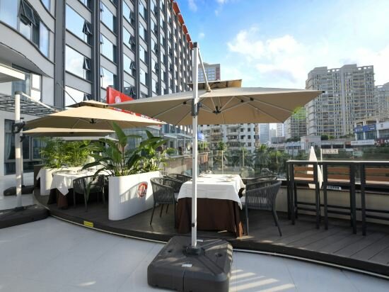 Фото Hainan Yehai Hotel