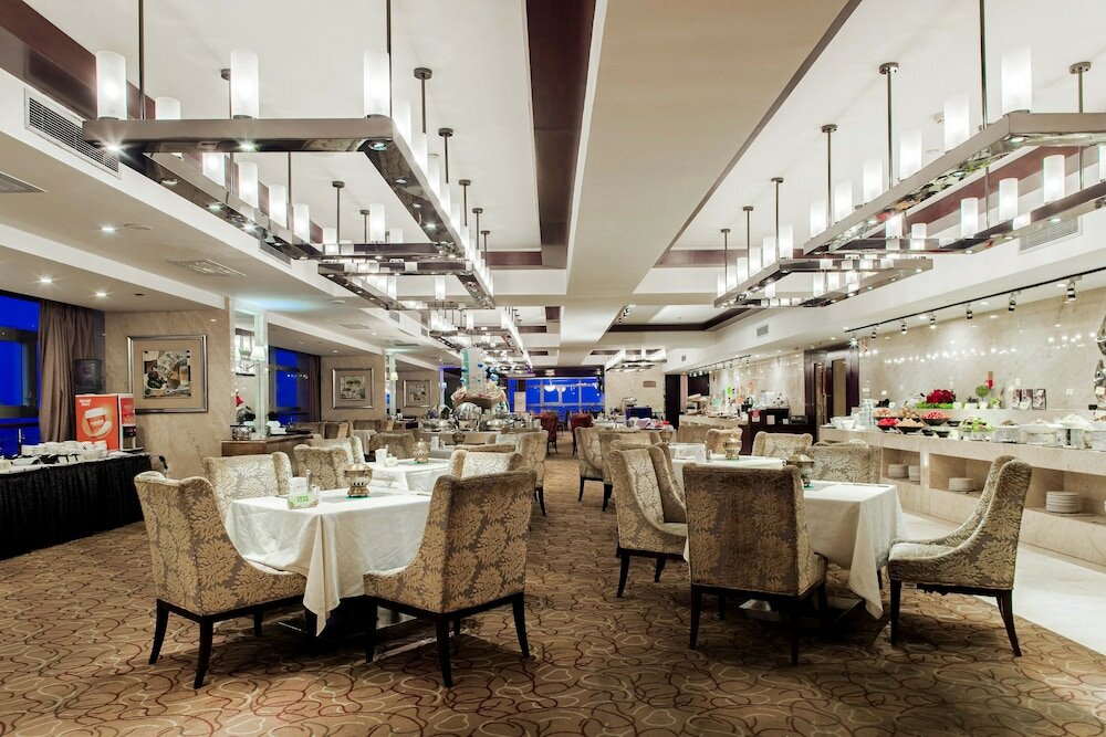 Фото Grand New Century Hotel