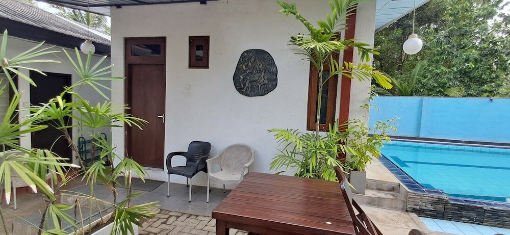 Фото Гостевой Дом Kutumbaya Resort