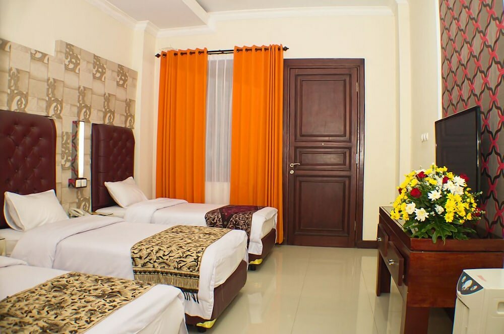 Фото Grand City Batu Hotel