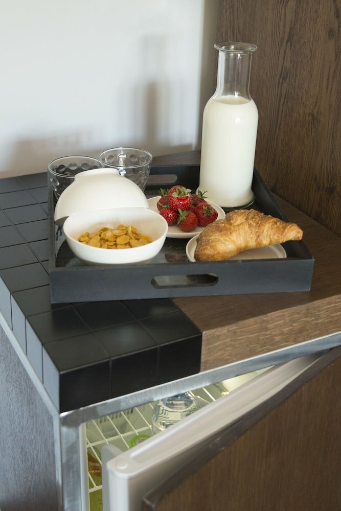 Фото Unicum Roma Suites