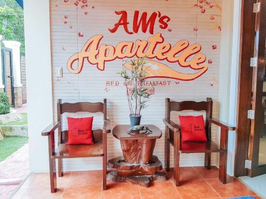 Фото RedDoorz @ Caimito Drive Dampas