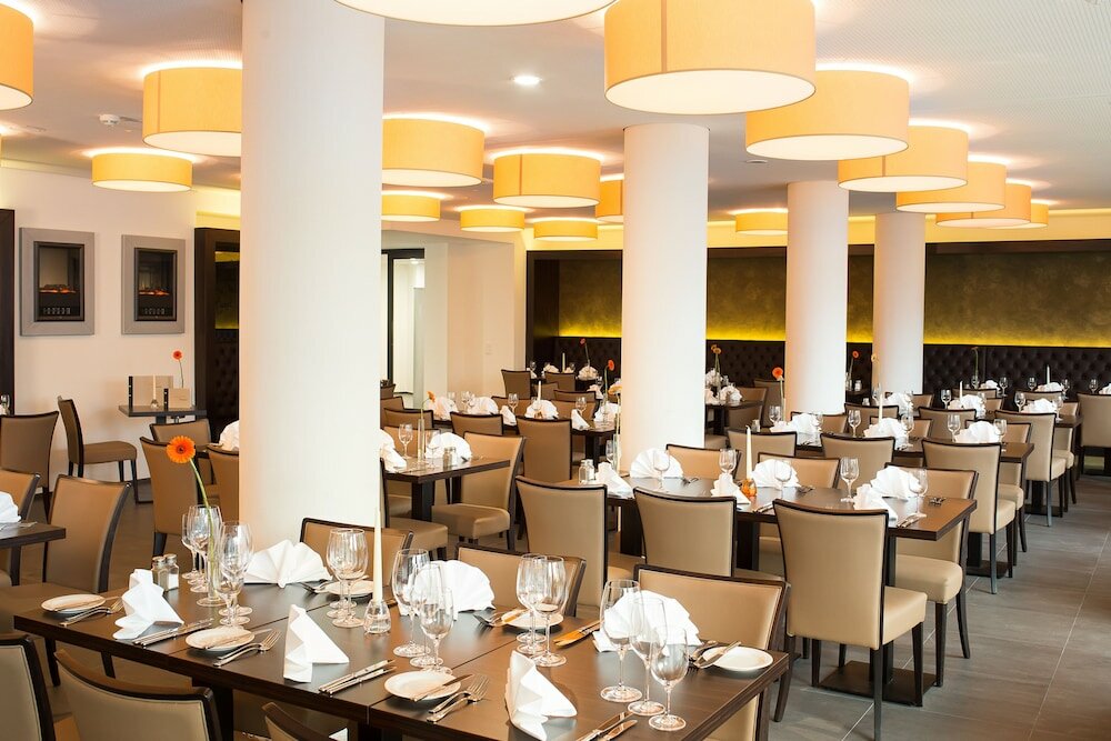 Фото Stadthotel am Römerturm