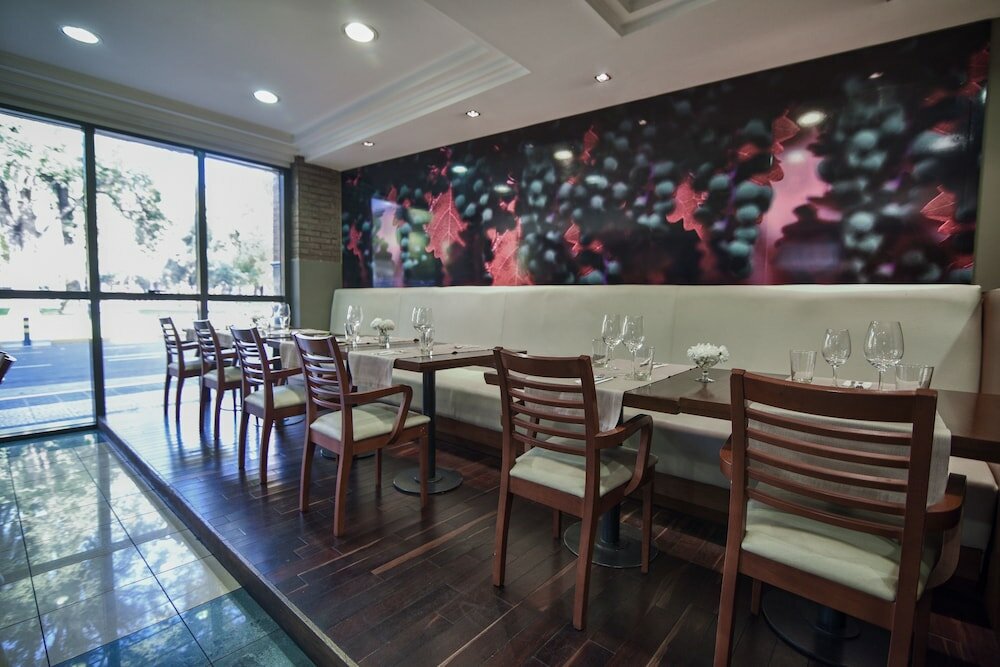 Фото Portal Plaza Suites