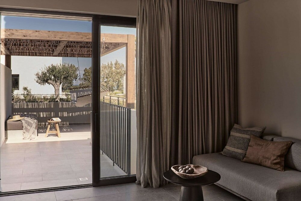 Фото Theros All Suite Hotel - Adults Only