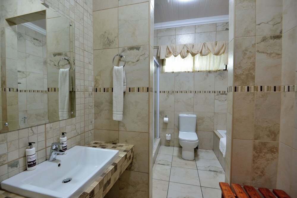 Фото Sunrock Guesthouse