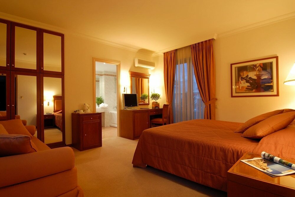 Фото Athens Atrium Hotel and Suites