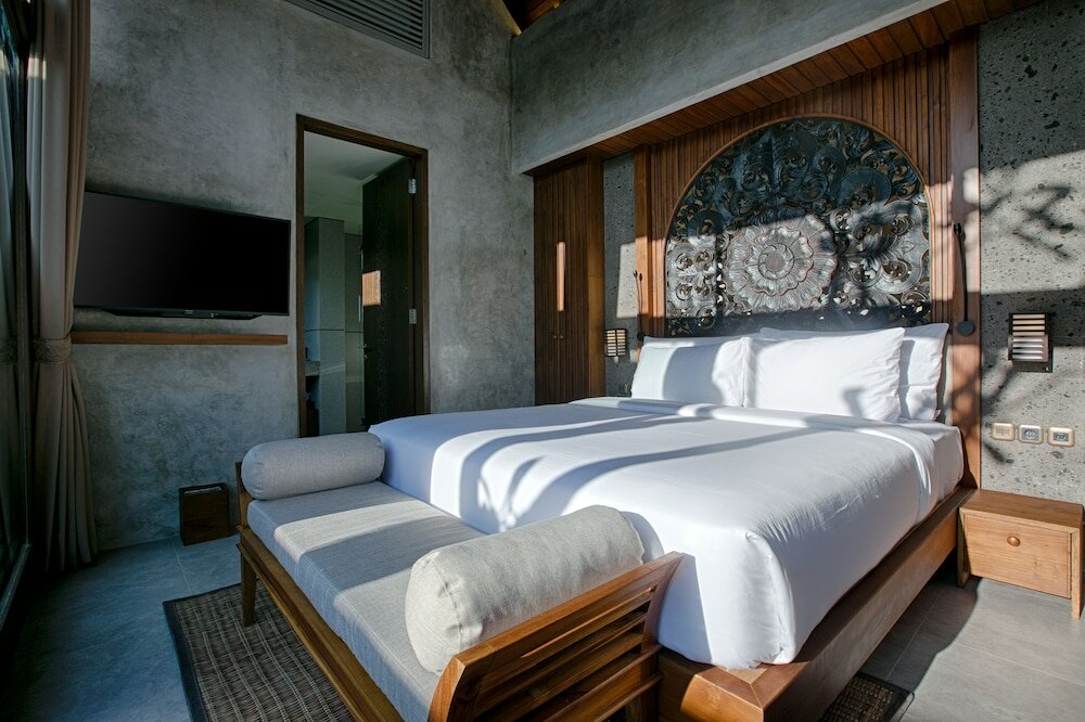 Фото Taman Dharmawangsa Suites