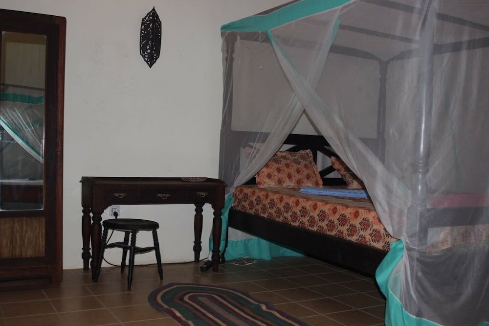 Фото Casa Umoja Guesthouse