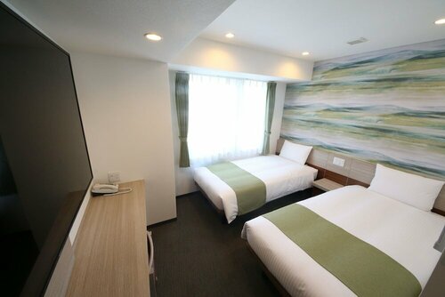 Гостиница Kuretake Inn Premium Numazu Kitaguchi Ekimae в Нумадзу