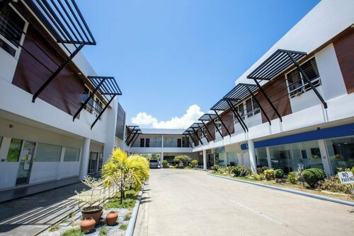 Внешний вид отеля Holiday Suites Hotel & Resort в Пуэрто-Принсесе, фото 4