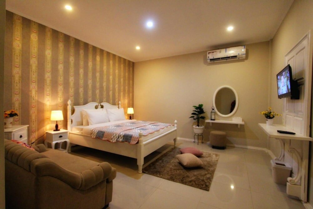 Фото Omah Madam Bed & Breakfast
