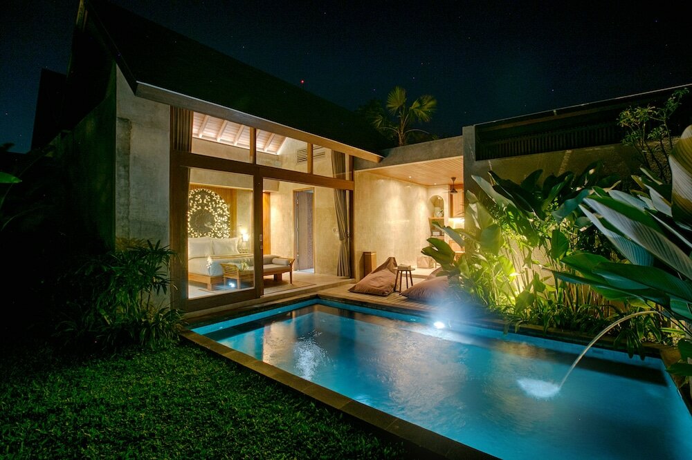 Фото Taman Dharmawangsa Suites