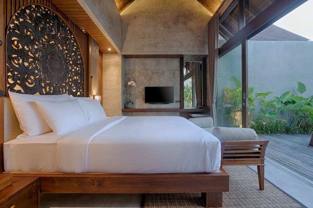 Фото Taman Dharmawangsa Suites