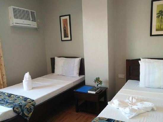 Фото Harbour Gardens Tourist Inn