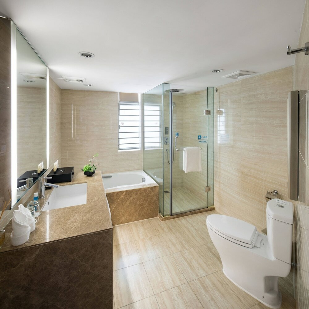 Фото Shenzhen New World Metro Grand Hotel