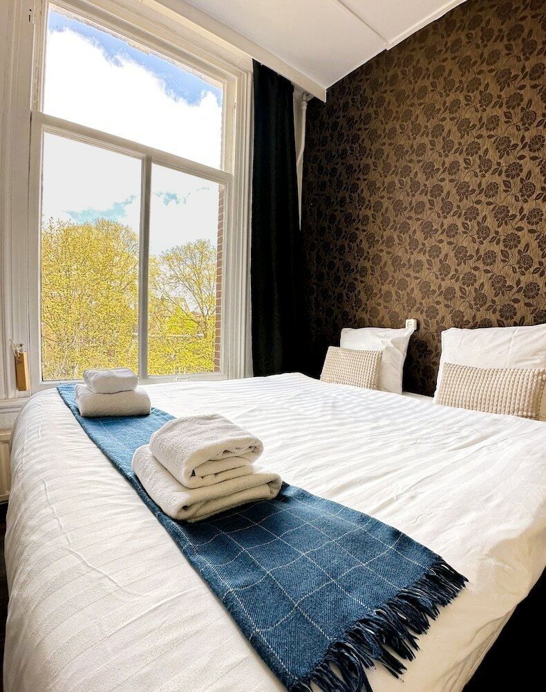 Фото Amsterdam Inn Hotel