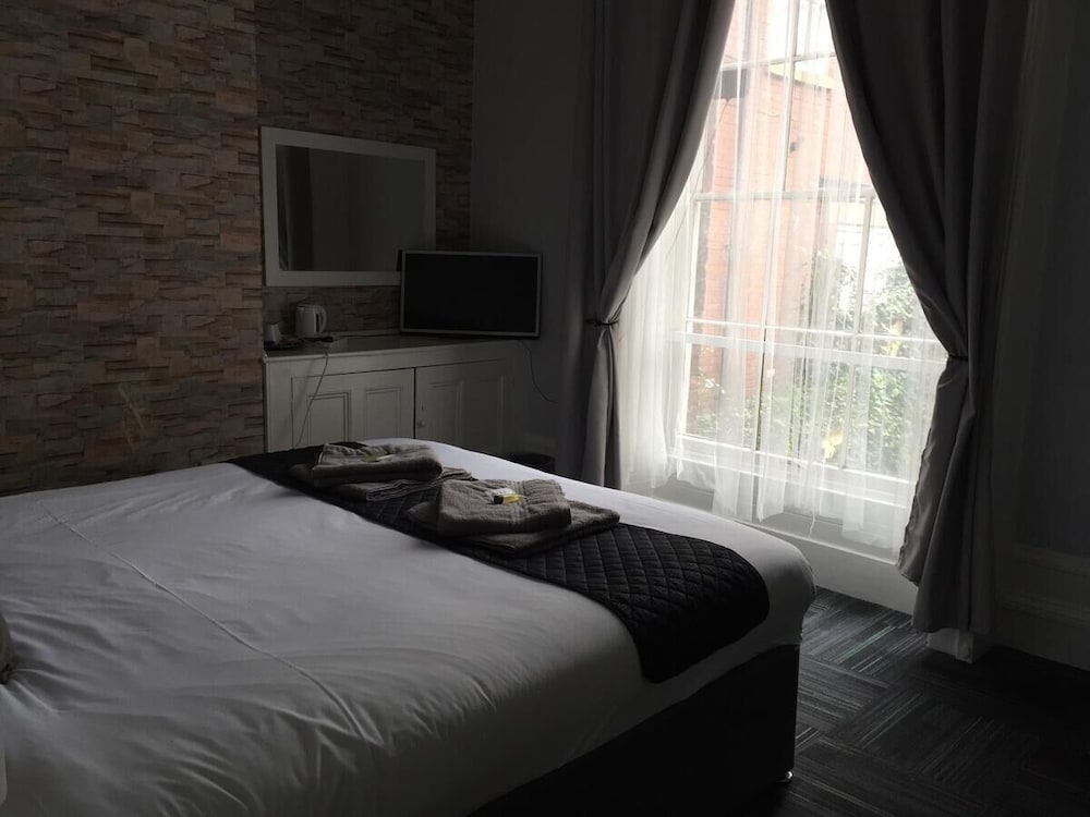 Фото Queens Guesthouse Manchester
