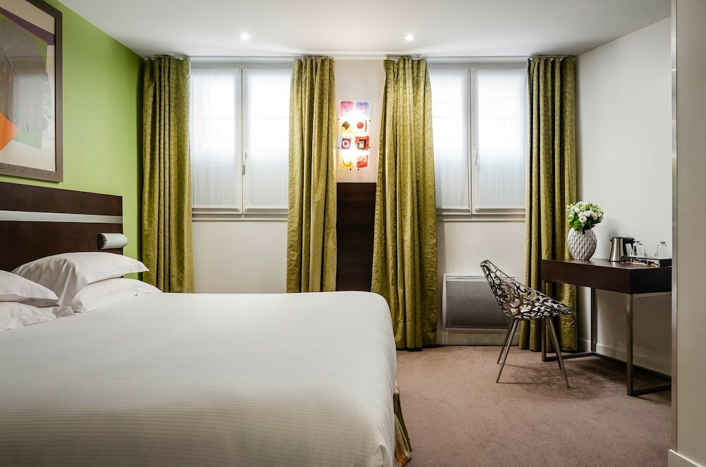 Фото Hotel Arc de Triomphe