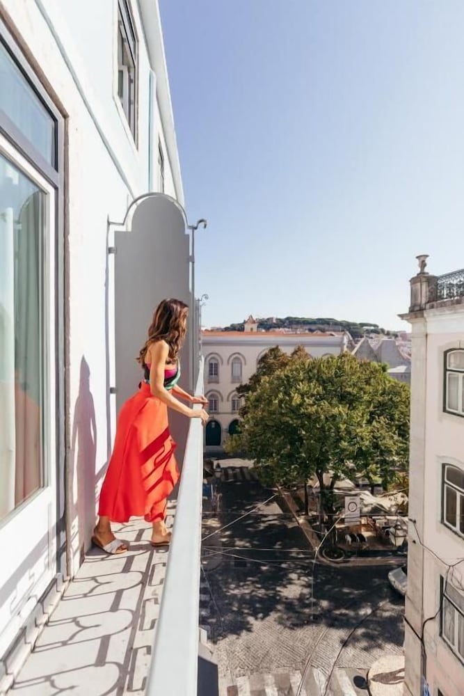 Фото Lisboa Carmo Hotel