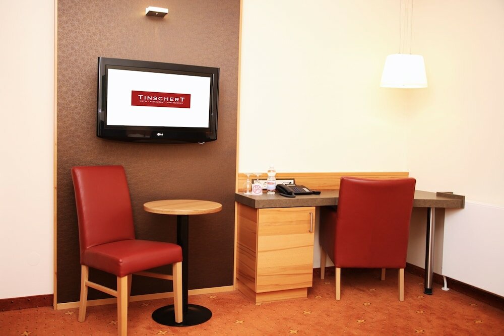 Фото Tinschert Hotel-Restaurant-Partyservice