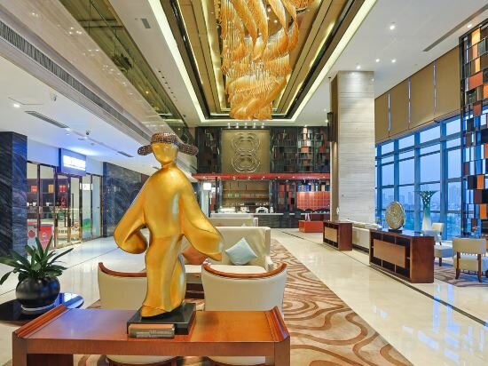 Фото Yiwu ShangCheng Hotel