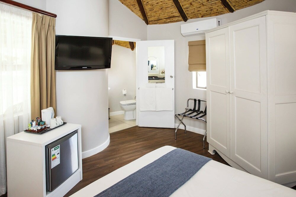 Фото Protea Hotel by Marriott Oudtshoorn Riempie Estate